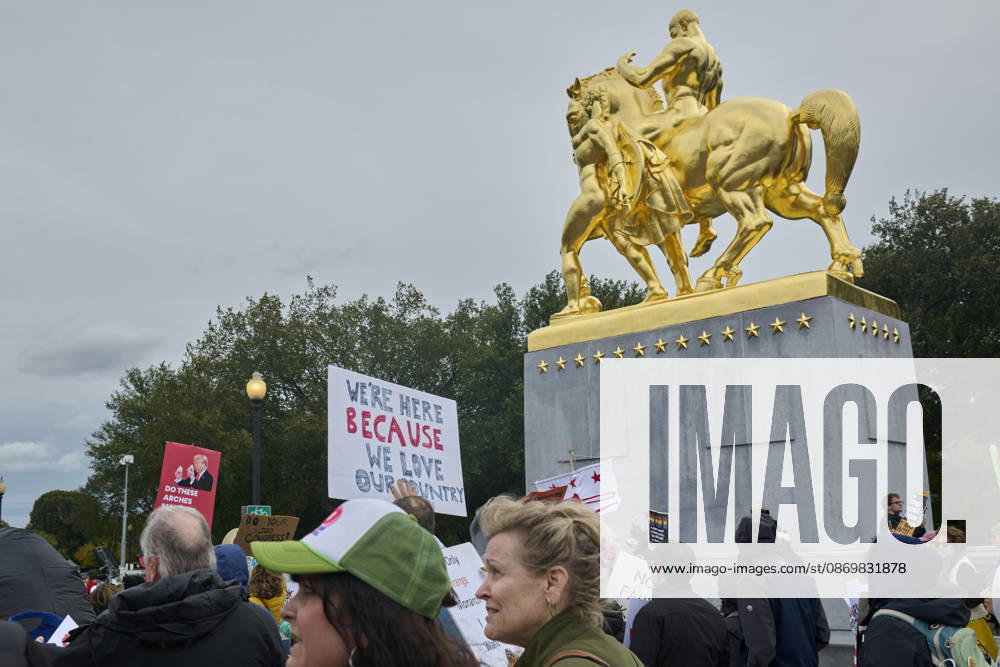 No Kings protesters march down Arlington Memorial Bridge past the Art of War statue for a rally at the Lincoln Memorial in Washington DC, Oct. 17, 2026. The march, intended to encourage people to vote in the 2026 US midterm elections, was part of a 50-state get out the vote operation by the left-leaning Indivisible group. Protesters denounced the administration of US President Donald Trump and the Republican-led Congress for violating Constitutional and civil rights, federal and state laws, judicial orders and longstanding norms, casting Trump and the GOP as a threat to democracy. Washington Dc USA - ZUMAg216 20261017_znp_g216_003