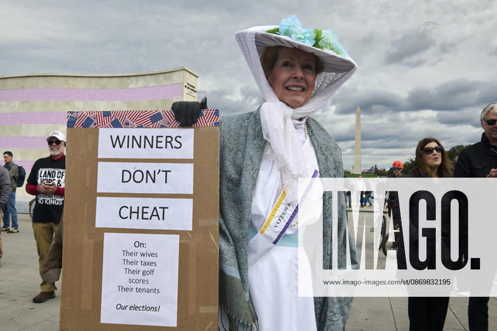 Kathleen Breslin, 61, of Virginia dresses as a suffragette during a No Kings protest at the steps of the Lincoln Memorial in Washington DC, Oct. 17, 2026. The march, intended to encourage people to vote in the 2026 US midterm elections, was part of a 50-state get out the vote operation by the left-leaning Indivisible group. Protesters denounced the administration of US President Donald Trump and the Republican-led Congress for violating Constitutional and civil rights, federal and state laws, judicial orders and longstanding norms, casting Trump and the GOP as a threat to democracy. Washington Dc USA - ZUMAg216 20261017_znp_g216_020