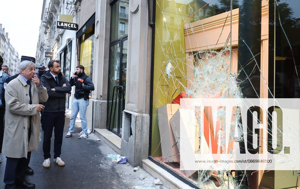 Riots and Looting: The Day After the Protest PHOTOPQR LE PROGRES Richard MOUILLAUD Lyon, October 18, 2026 Riots and Looting: The Day After the Protest Riots and Looting: The Day After the Protest The prefect and the mayor of Lyon survey the damage in front of the store Lancel Lyon, October 18, 2026: 20,000 people demonstrated in the streets of Lyon. Violence overshadowed the protesters’ demands, resulting in a level of chaos rarely seen in the city. The tourist office was set on fire, and numerous stores were looted. Lyon, October 18, 2026. 20,000 people demonstrated in the streets of Lyon. Violence overshadowed the protesters’ demands, resulting in a level of chaos rarely seen in the city. The tourist office was set on fire, and a great m