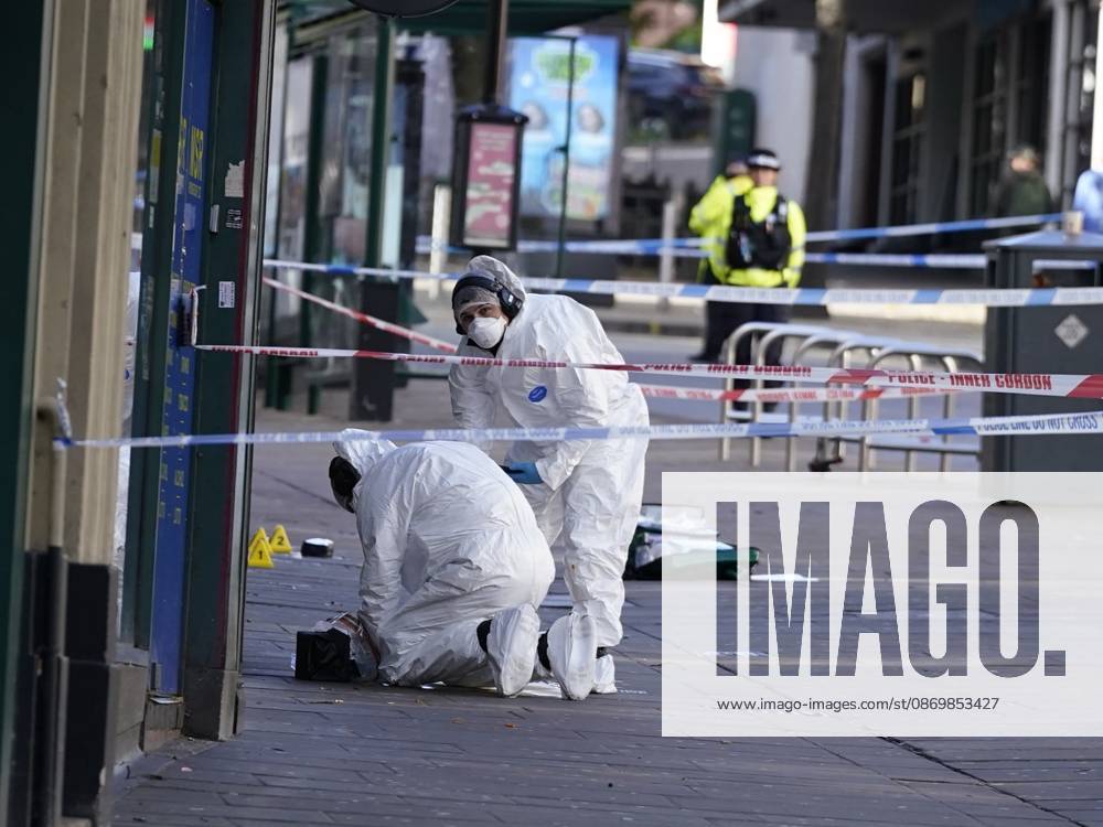 Forensic investigators examine scene after police officer shot in Nottingham NOTTINGHAM, UNITED KINGDOM - OCTOBER 18: Forensic investigators in protective suits examine a cordoned-off crime scene as police officers secure the area after a police office was shot early in the morning on October 18, 2026, in Nottingham, United Kingdom. The scene remains cordoned off following a reported shooting involving a police officer earlier in the morning. A police officer was shot after approaching two people earlier in the morning and was taken to hospital for treatment, according to Nottinghamshire Police. Giannis Alexopoulos Anadolu Nottingham United Kingdom. Editorial use only. Please get in touch for any other usage.