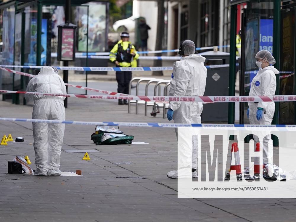Forensic investigators examine scene after police officer shot in Nottingham NOTTINGHAM, UNITED KINGDOM - OCTOBER 18: Forensic investigators in protective suits examine a cordoned-off crime scene as police officers secure the area after a police office was shot early in the morning on October 18, 2026, in Nottingham, United Kingdom. The scene remains cordoned off following a reported shooting involving a police officer earlier in the morning. A police officer was shot after approaching two people earlier in the morning and was taken to hospital for treatment, according to Nottinghamshire Police. Giannis Alexopoulos Anadolu Nottingham United Kingdom. Editorial use only. Please get in touch for any other usage.