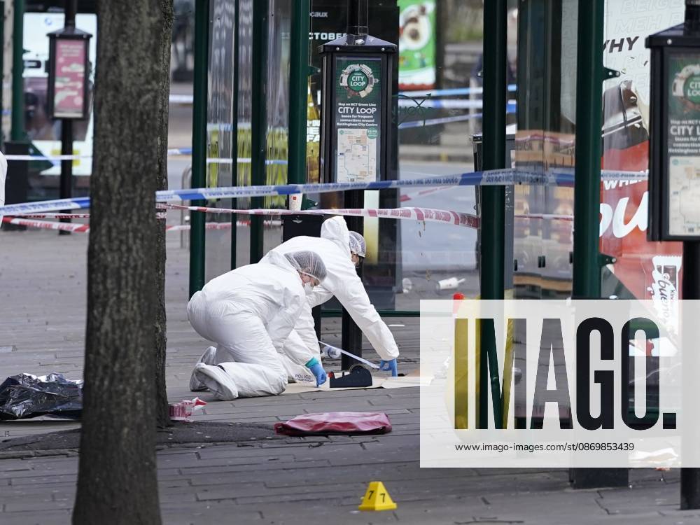 Forensic investigators examine scene after police officer shot in Nottingham NOTTINGHAM, UNITED KINGDOM - OCTOBER 18: Forensic investigators in protective suits examine a cordoned-off crime scene as police officers secure the area after a police office was shot early in the morning on October 18, 2026, in Nottingham, United Kingdom. The scene remains cordoned off following a reported shooting involving a police officer earlier in the morning. A police officer was shot after approaching two people earlier in the morning and was taken to hospital for treatment, according to Nottinghamshire Police. Giannis Alexopoulos Anadolu Nottingham United Kingdom. Editorial use only. Please get in touch for any other usage.