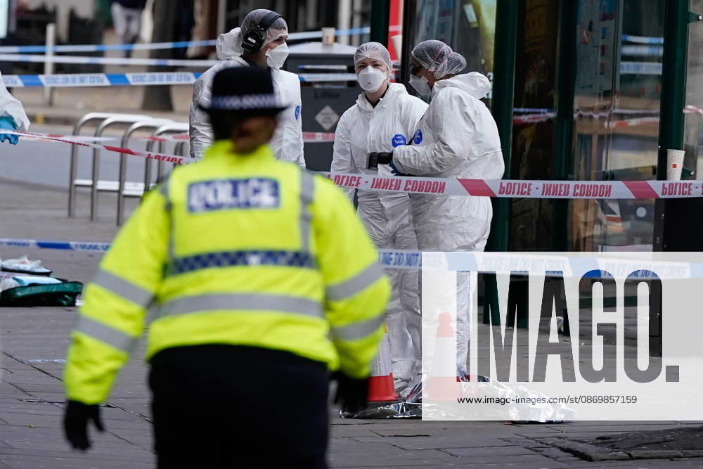 Forensic investigators examine scene after police officer shot in Nottingham NOTTINGHAM, UNITED KINGDOM - OCTOBER 18: Forensic investigators in protective suits examine a cordoned-off crime scene as police officers secure the area after a police office was shot early in the morning on October 18, 2026, in Nottingham, United Kingdom. The scene remains cordoned off following a reported shooting involving a police officer earlier in the morning. A police officer was shot after approaching two people earlier in the morning and was taken to hospital for treatment, according to Nottinghamshire Police. Loannis Alexopoulos Anadolu Nottingham United Kingdom. Editorial use only. Please get in touch for any other usage.