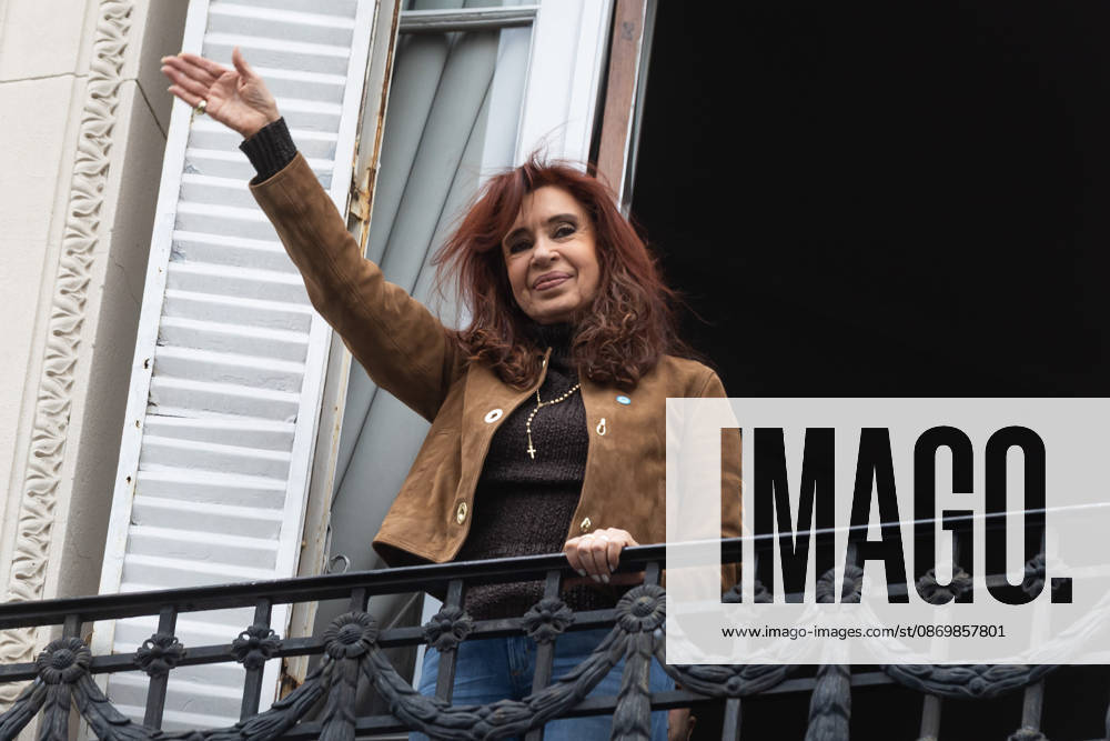 Former President Cristina FernoÂ¡ndez de Kirchner greets her supporters from the balcony of her home, where she is serving house arrest. Buenos Aires Argentina - ZUMAp265 20261018_zip_p265_005