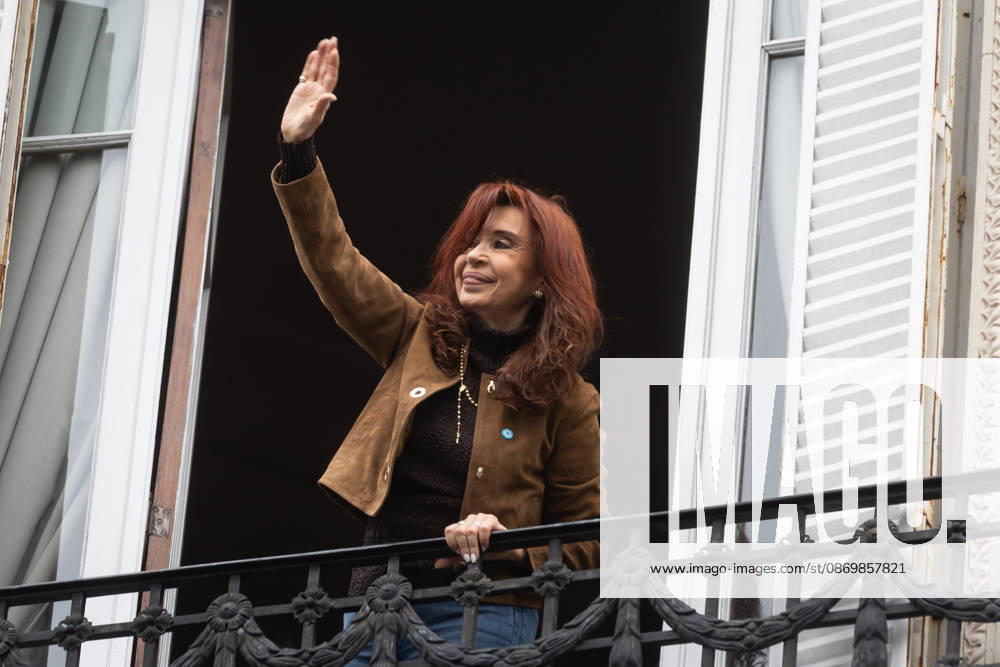 Former President Cristina Ferno¡ndez de Kirchner greets her supporters from the balcony of her home, where she is serving house arrest. Buenos Aires Argentina - ZUMAp265 20261018_zip_p265_006