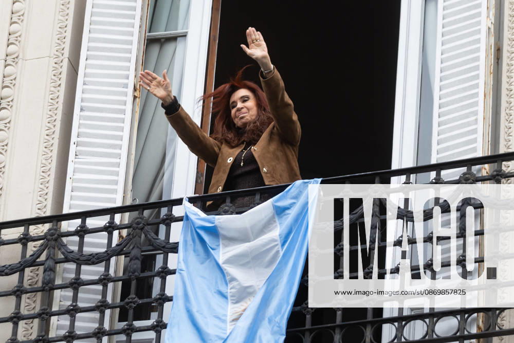 Former President Cristina Ferno¡ndez de Kirchner greets her supporters from the balcony of her home, where she is serving house arrest. Buenos Aires Argentina - ZUMAp265 20261018_zip_p265_008