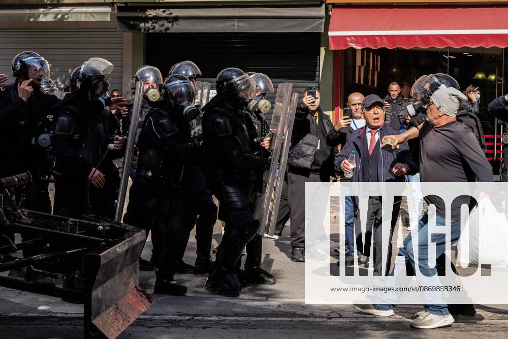 TIRANA, ALBANIA, OCTOBER 18, 2026: Demonstrators clash with riot police outside the Ministry of Education in Tirana as student-led anti-government protests continue for a sixth consecutive day. Protesters throw stones while police respond with tear gas, water cannons and rubber bullets. The demonstrations demand improved university conditions and the resignation of Prime Minister Edi Rama. Tirana Albania - ZUMAq101 20261018_zna_q101_065