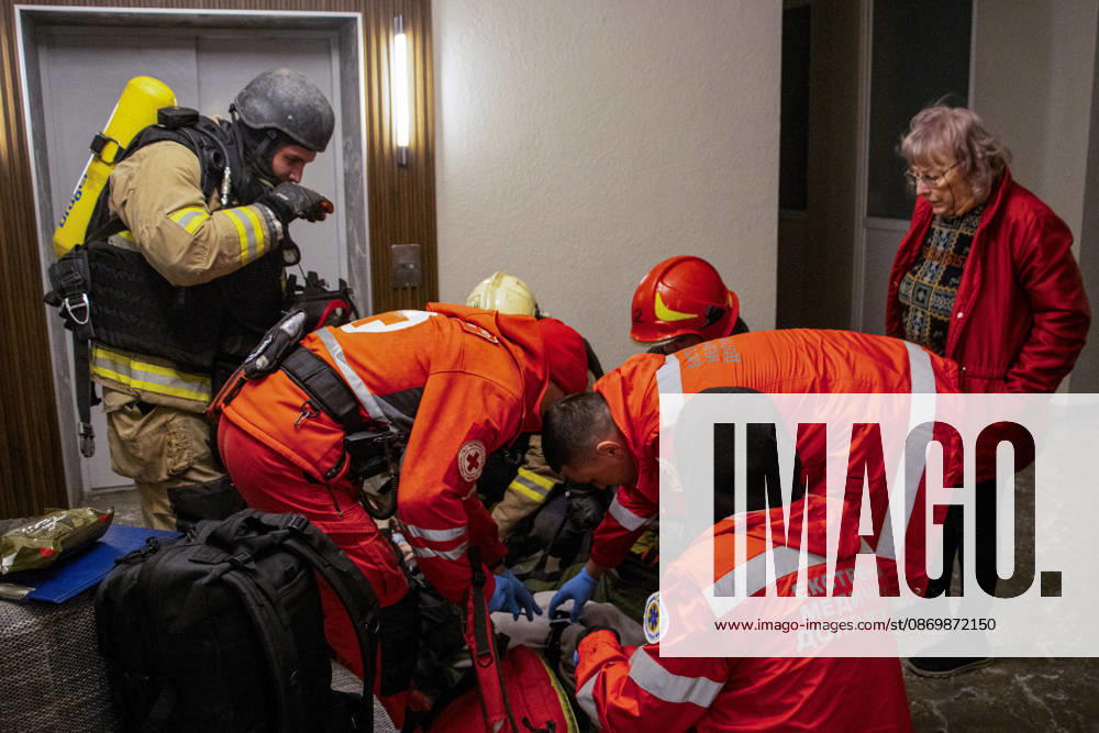 Odesa Ukraine Residential Fire Rescue workers provide medical assistance to an injured person inside a residential building in Odesa, Ukraine on October 18, 2026. Emergency services responded after a fire broke out at the building, prompting a rescue operation and deployment of firefighters to the scene. Odesa Odesa Ukraine