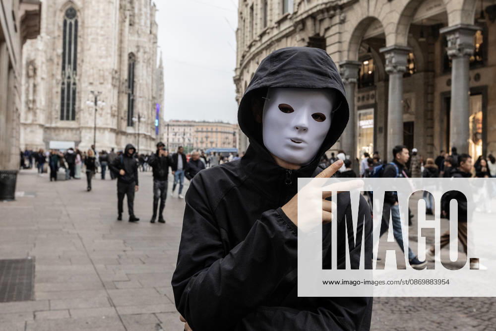 Police detain 160 as unrest continues for second day in Milan MILAN, ITALY - OCTOBER 18: A protester is seen wearing a mask during a protest in Milan, Italy, on October 18, 2026, a day after protests against the rising cost of living. Groups threw stones, bottles, firecrackers and barriers at officers, who responded with tear gas and water cannon. Shops were damaged and looted around the city center, while a Carabinieri vehicle was destroyed. Andrea Carrubba Anadolu Milan Italy. Editorial use only. Please get in touch for any other usage.