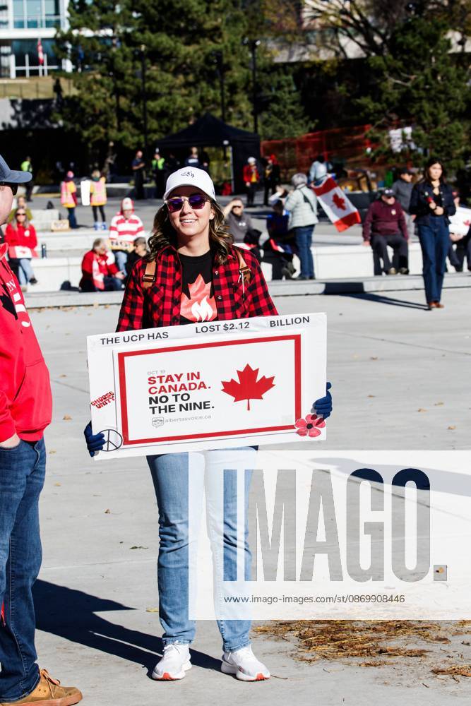 Supporters display their signs at the Alberta Federation of Labour s Canada Unity Rally at the Alberta Legislature, ahead of the Alberta Referendum..With less than 24 hours until Referendum voting starts, the Alberta Federation of Labour and Fight Back supporters rallied at the Alberta Legislature grounds to support a Unified Alberta in Canada and oppose the prospect of separation from Canada. The group is opposed to the 9 other questions on the Alberta referendum ballots. Edmonton Canada - ZUMAs197 20261018_aaa_s197_645