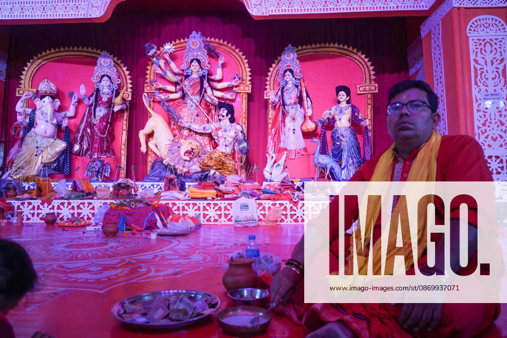 Dhaka, Bangladesh, October 19, 2026 Hindu devotees offer prayers during Maha Ashtami and receive prasad as Sharadiya Durga Puja, the largest religious festival of Bangladeshs Hindu community, is celebrated across the country. Temples and puja mandaps are witnessing large gatherings of worshippers who come together to offer anjali, seek blessings and participate in religious ceremonies. The festival atmosphere is marked by colorful decorations, traditional attire and joyful celebrations, as people of all ages gather with family and friends to observe the occasion. From morning prayers to the distribution of prasad, temples across the country remain vibrant with devotion, enthusiasm and festi - ZUMAk185 20261019_zip_k185_050