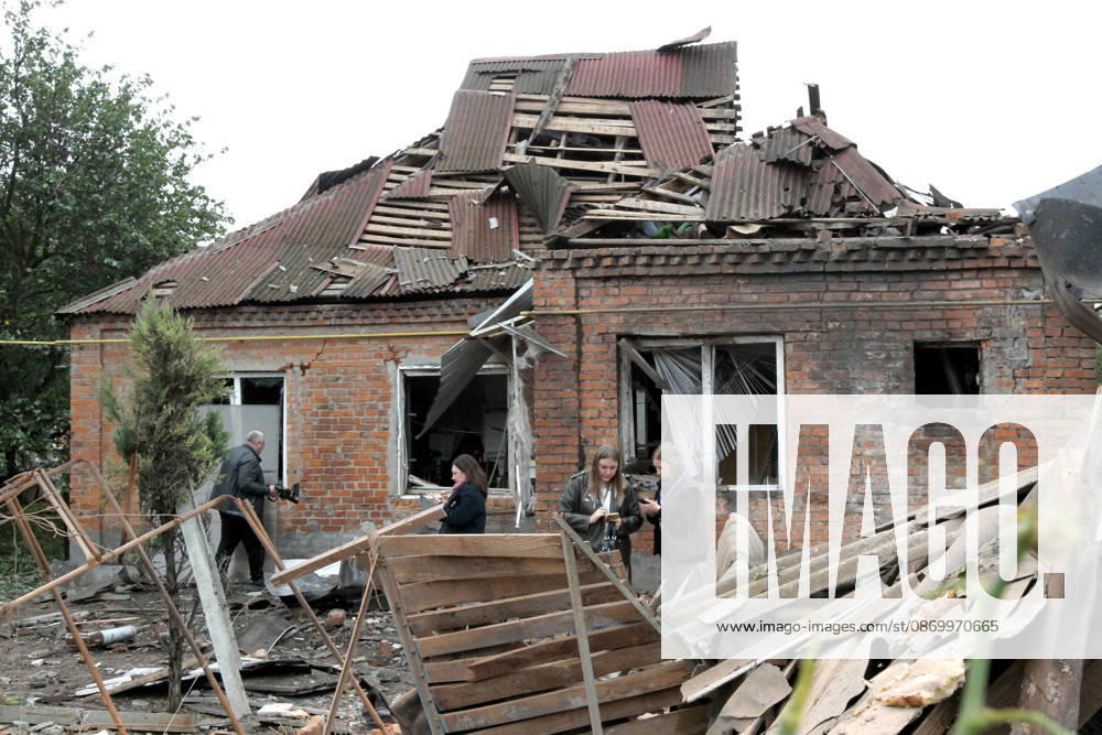 Russian troops hit Dnipro with guided bombs People stand outside a house damaged by a Russian bombardment in Dnipro, Ukraine, on October 19, 2026. On Monday morning, Russian forces launched guided aerial bombs at the eastern city, damaging private homes and infrastructure. An 84-year-old woman was hospitalised in moderate condition. Dnipro Ukraine