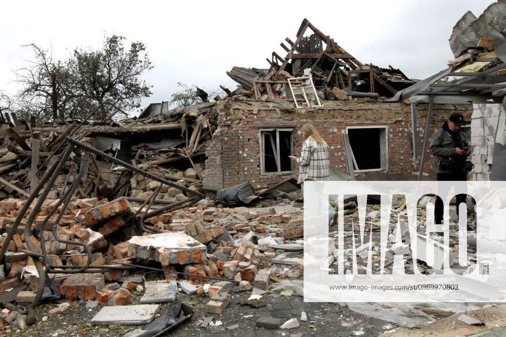 Russian troops hit Dnipro with guided bombs A man and a woman stand among the rubble near a house damaged by a bombardment in Dnipro, Ukraine, on October 19, 2026. On Monday morning, forces launched guided aerial bombs at the eastern city, damaging private homes and infrastructure. An 84-year-old woman was hospitalised in moderate condition. Dnipro Ukraine