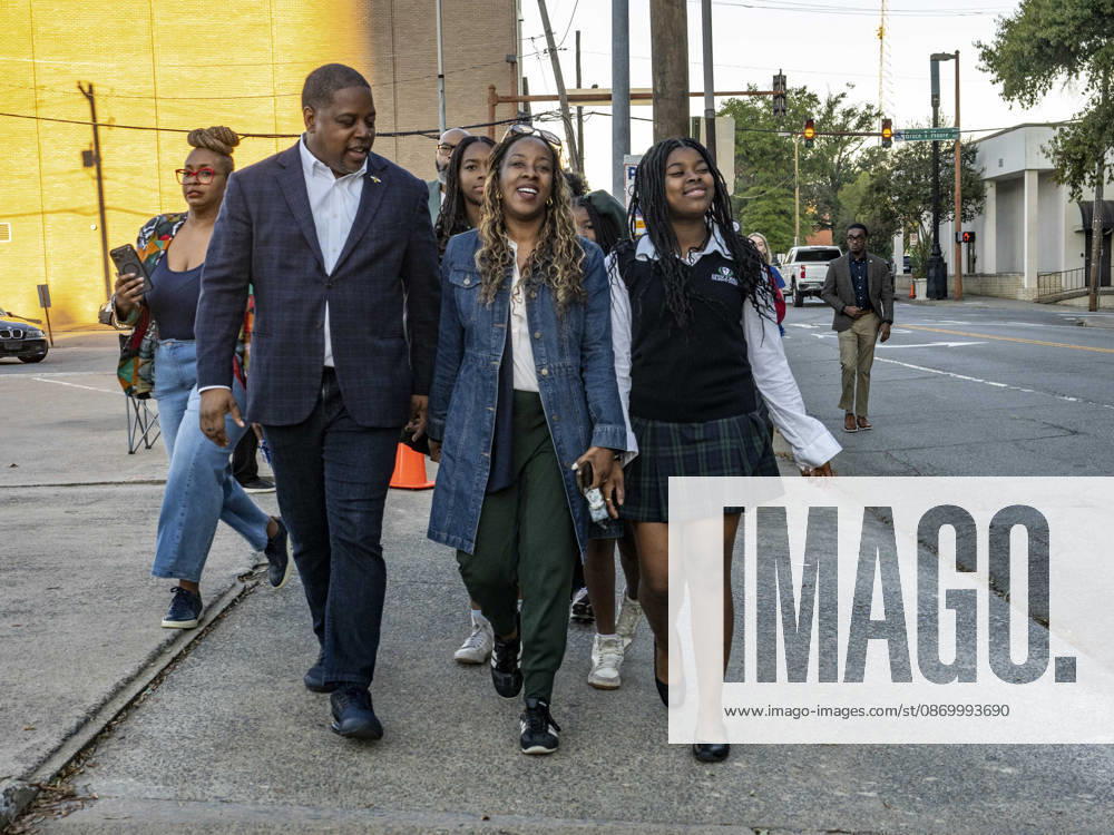 Democratic Congressional candidate CHRIS JONES heads to the polls with family and supporters on the first day of early vote in Arkansas. He is joined in the front line with his wife JERRILYN JONES and daughter JANELLE JONES. Daughters JORDYN and JASMINE JONES are behind them. Jones is running for the seat now held by Rep. French Hill (R-AR). Should Jones win, he will be the first Black person Arkansas sends to Congress. Little Rock USA - ZUMAd155 20261019_znp_d155_023