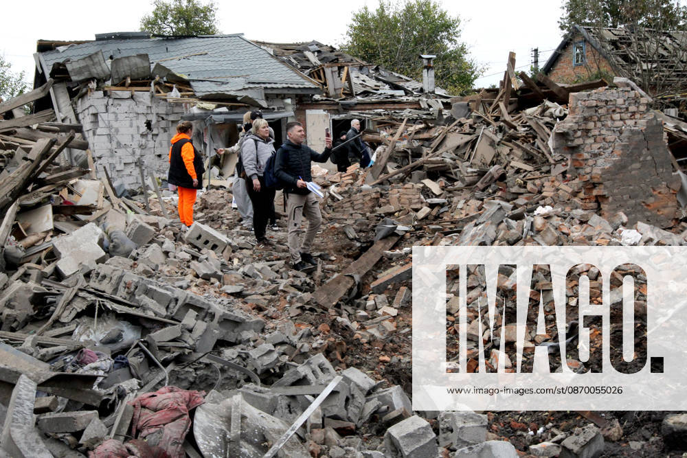 Russian troops hit Dnipro with guided bombs People stand outside a house damaged by a Russian bombardment in Dnipro, Ukraine, on October 19, 2026. On Monday morning, Russian forces launched guided aerial bombs at the eastern city, damaging private homes and infrastructure. An 84-year-old woman was hospitalised in moderate condition. Dnipro Ukraine