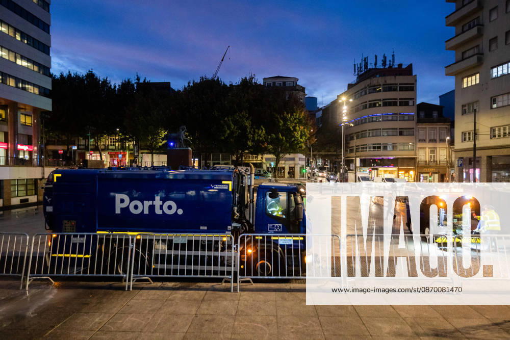Municipal workers install metal barriers at Praca D. Joao I following the dismantling of the housing protest camp. Cleaning and restoration operations continued after the encampment was removed. Porto Portugal - ZUMAs197 20261020_aaa_s197_056