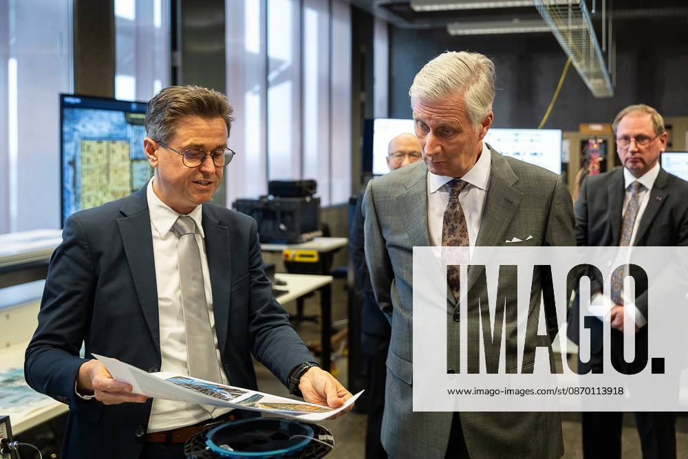 UGent professor Johan Bauwelinck and King Philippe - Filip of Belgium pictured during a visit to IGent, a research building at the UGent University where scientists and companies collaborate to develop innovative technologies, on Tuesday 20 October 2026, in Gent. JAMESxARTHURxGEKIERE 190398514