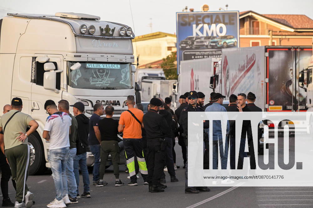 Shops closed due to protests in Vibo Valentia CALABRIA, ITALY - OCTOBER 20: Truck drivers, local people and police seen in S. Onofrio’s crossroad.Protests for hight cost of living and fuel prices spontaneously organized by truck drivers and workers in agriculture sector sparkled in Calabria, South Italy, since early October, severely affecting supply chain distribution. in Vibo Valentia protests go on with closed shop, for disruption of HGV supply chain, and local audience attending pacific protests at S. Onofrio’s crossroad. Protests in Calabria will go on until October 27th. Valeria Ferraro Anadolu Calabria Italy. Editorial use only. Please get in touch for any other usage.