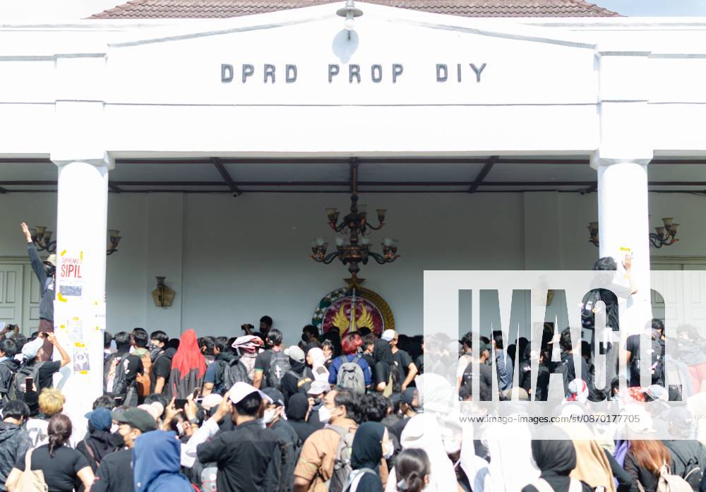 Yogyakarta Students Protest Government Policies YOGYAKARTA, INDONESIA, OCTOBER 20, 2026: University students and activists hold banners and flags during a demonstration outside the Regional People s Representative Council (DPRD) building in Yogyakarta. The rally marks two years of President Prabowo Subianto and Vice President Gibran Rakabuming Rakas administration, with protesters calling for policy reforms and greater government accountability. Yogyakarta Indonesia
