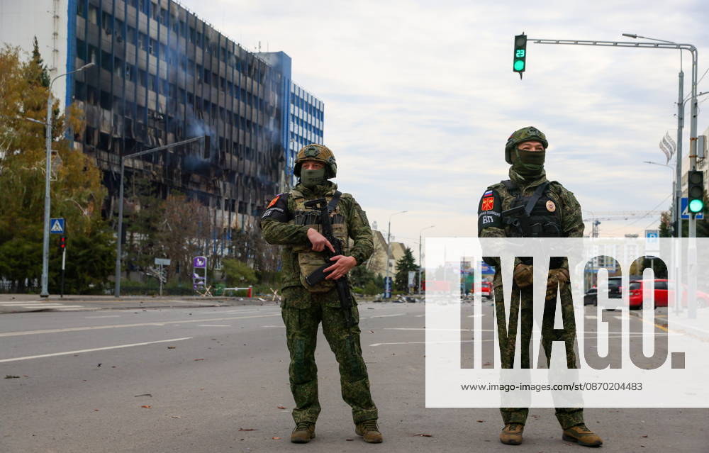 RUSSIA, LUGANSK - OCTOBER 21, 2026: Military police officers stand guard outside a communication hub damaged by a Ukrainian drone strike. Alexander Reka TASS 99700489