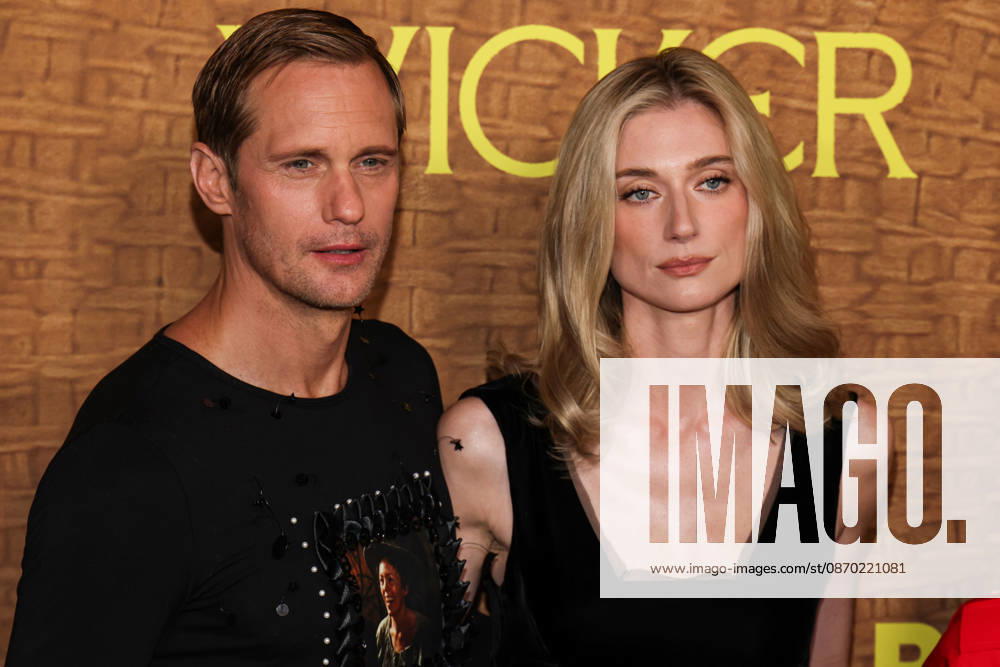 Los Angeles Premiere Of Black Bear s Wicker LOS ANGELES, CALIFORNIA, USA - OCTOBER 20: Alexander Skarsgard wearing Chopova Lowena, styled by Harry Lambert and Elizabeth Debicki wearing Kallmeyer, Calzedonia tights, Manolo Blahnik shoes, and Engelbert 1920 jewelry, styled by Elizabeth Saltzman arrive at the Los Angeles Premiere Of Black Bear s Wicker held at the DGA Theater Complex at The Directors Guild of America on October 20, 2026 in Los Angeles, California, United States. Los Angeles DGA Theater Complex at The Directors Guild of America California United States