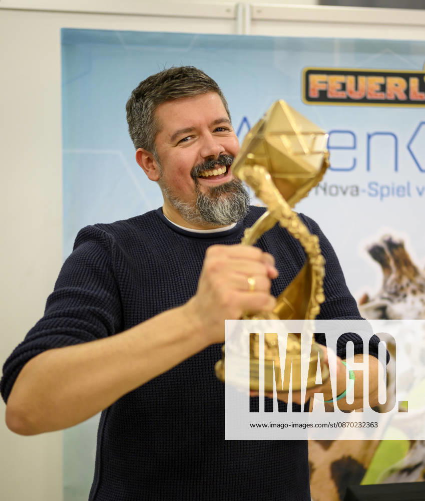 Author Mathias Wigge, winner of the 1st prize for the game, 1st place: Artengarten Verlag’s *Feuerland*, designed by Mathias Wigge; German Game Award on October 21, 2026, at the SPIEL Essen trade fair from October 22–25, 2026, in Essen, Germany, at the Grugahalle
