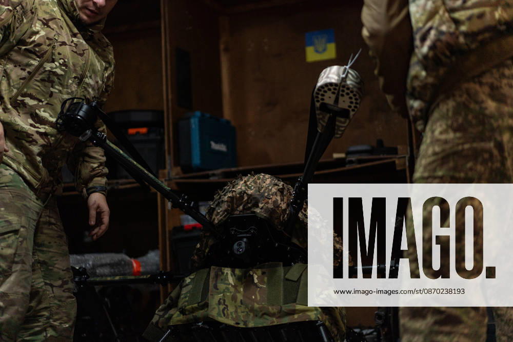 Ukrainian drone unit Skymonsters upgrades heavy UAVs in Kharkiv region KHARKIV REGION, UKRAINE - OCTOBER 21: Members of Skymonsters, the drone unit of the 13th Khartiia Brigade of Ukraine s National Guard, assemble, upgrade, and repair large unmanned aerial vehicles at an undisclosed location in Kharkiv region, Ukraine, on October 21, 2026. The drones, including Vampire models used for logistics missions and heavy bombers capable of carrying 13 to 20 kilograms of explosives, are prepared here before deployment to frontline positions. Carlo Bravo Anadolu Kharkiv Ukraine. Editorial use only. Please get in touch for any other usage.
