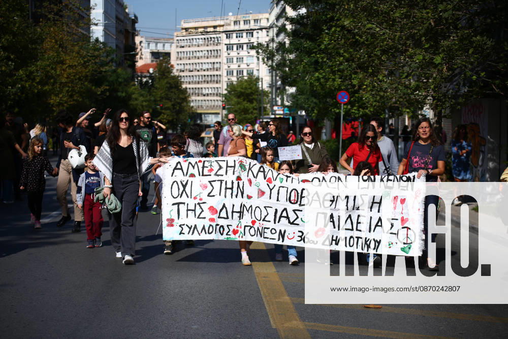 Students, school pupils, teachers and university professors take part in a large education protest. Thousands of demonstrators march through the city center, carrying banners and chanting slogans during the mass mobilization. Athens GREECE - ZUMAx103 20261021_zip_x103_010