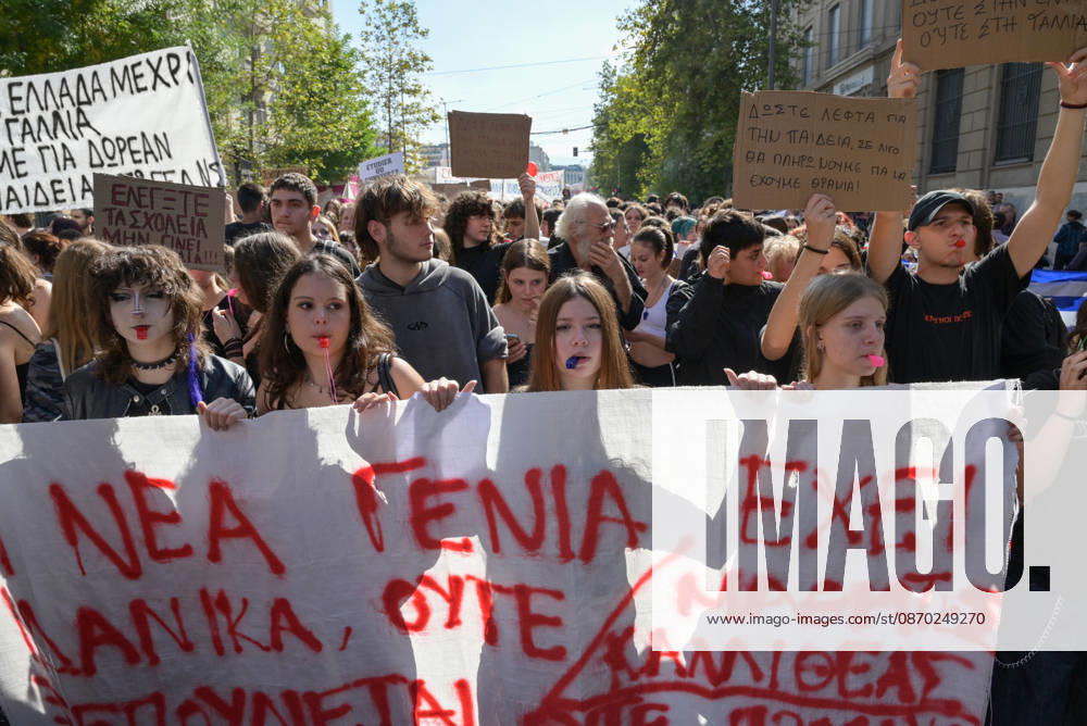 Students and teachers protest over education funding and living costs in Athens Students march through central Athens holding banners and signs during a demonstration demanding increased funding for public education and measures to address rising living costs. Athens Greece