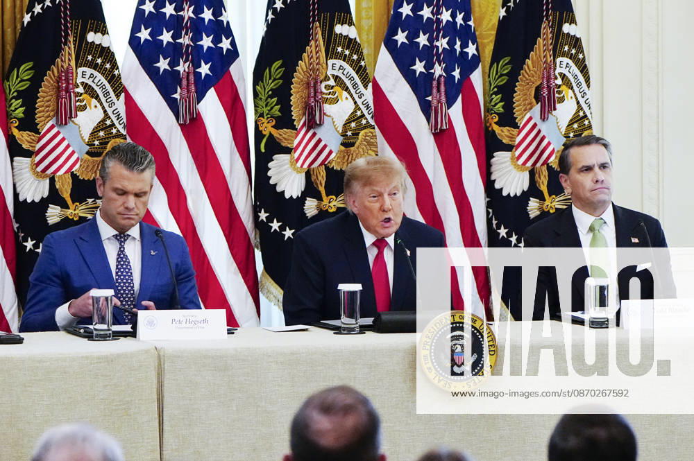 President Donald Trump sits with Defense Secretary ?Pete Hegseth (L) and Attorney General Todd Blanche (R) as he hosts a roundtable discussion on cybercrime in the East Room of the White House in Washington, DC on Wednesday, October 21, 2026. The discussion focuses on combatting foreign-based organized crime targeting Americans online and federal seizures of fraudulent crypto and scam websites. WAP20261021904 BONNIExCASH