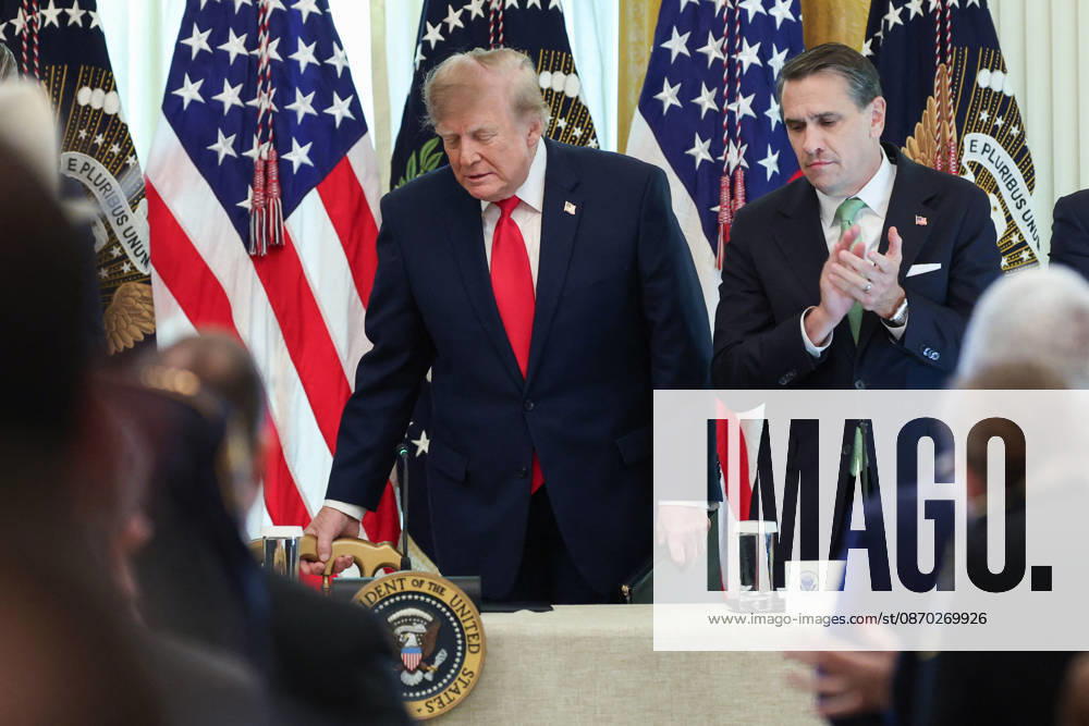 DC: President Trump Hosts Roundtable on Cybercrime at White House President Donald Trump and Todd Blanche, U.S. Attorney General, arrive for a roundtable discussion on cybercrime in the East Room of the White House on October 21, 2026 in Washington, D.C. The administration is fighting back against foreign-based organized criminal organizations that exploit Americans in cyberspace and their scam centers and fraud schemes. (Photo by Samuel Corum Pool ABACAPRESS.COM) Washington DC United States