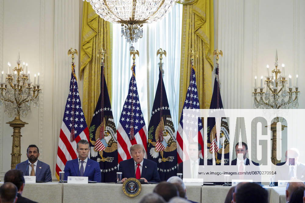 US President Donald J. Trump hosts a roundtable on Protecting American Families and Seniors from Cybercrime US President Donald J. Trump, with FBI Director Kash Patel (L), Secretary of Defense Pete Hegseth (2-L) and Attorney General Todd Blanche (3-R), Secretary of Homeland Security Markwayne Mullin (2-R) and Senior advisor Stephen Miller (R), delivers remarks during a roundtable on Protecting American Families and Seniors from Cybercrime in the East Room of the White House in Washington, DC USA, 21 October 2026. WASHINGTON DISTRICT OF COLUMBIA United States