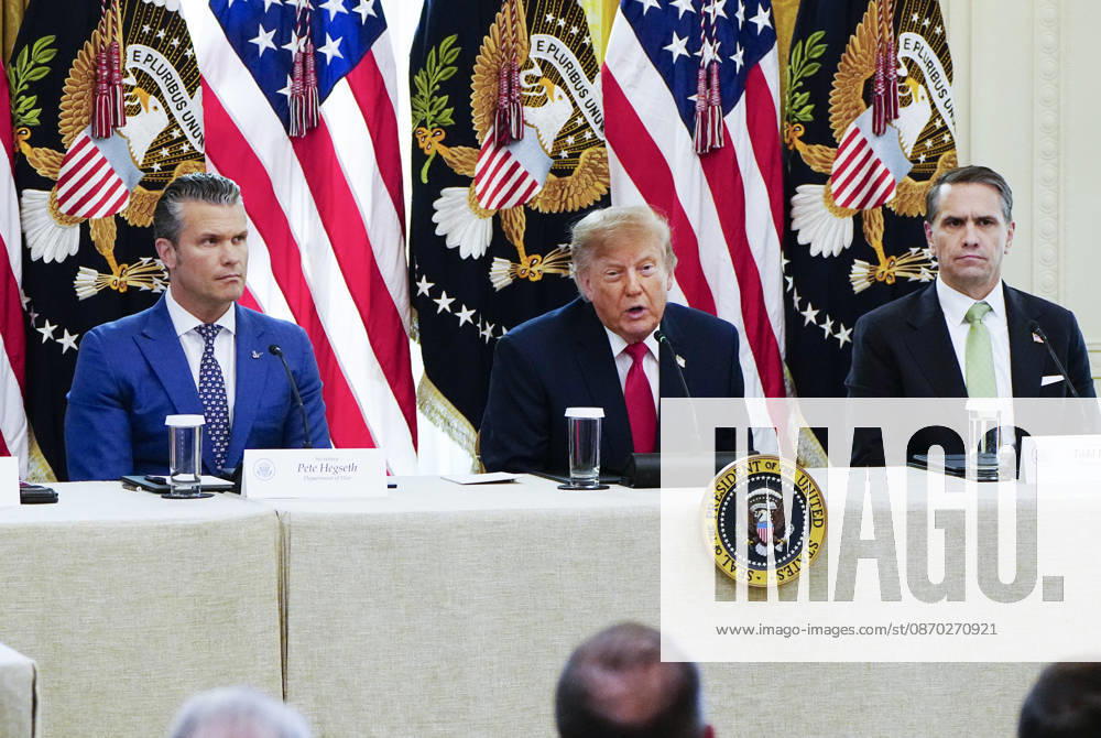 President Donald Trump speaks as Defense Secretary ?Pete Hegseth (L) and Attorney General Todd Blanche (R) listen during a roundtable discussion on cybercrime in the East Room of the White House in Washington, DC on Wednesday, October 21, 2026. The discussion focuses on combatting foreign-based organized crime targeting Americans online and federal seizures of fraudulent crypto and scam websites. WAP20261021927 BONNIExCASH