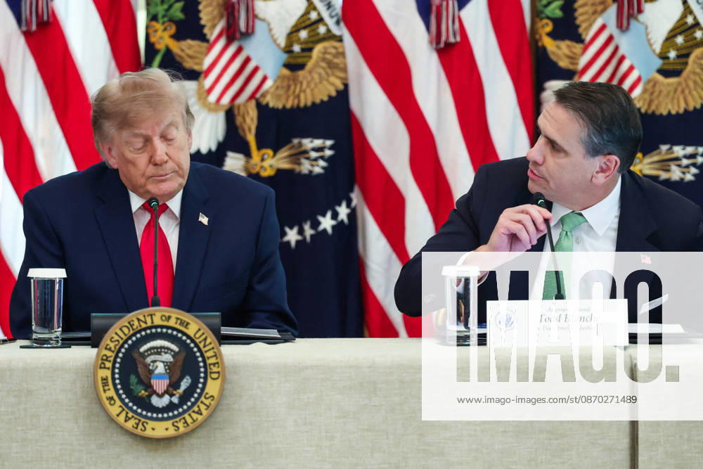 DC: President Trump Hosts Roundtable on Cybercrime at White House President Donald Trump listens as Todd Blanche, U.S. Attorney General, speaks during a roundtable discussion on cybercrime in the East Room of the White House on October 21, 2026 in Washington, D.C. The administration is fighting back against foreign-based organized criminal organizations that exploit Americans in cyberspace and their scam centers and fraud schemes. (Photo by Samuel Corum Pool ABACAPRESS.COM) Washington DC United States