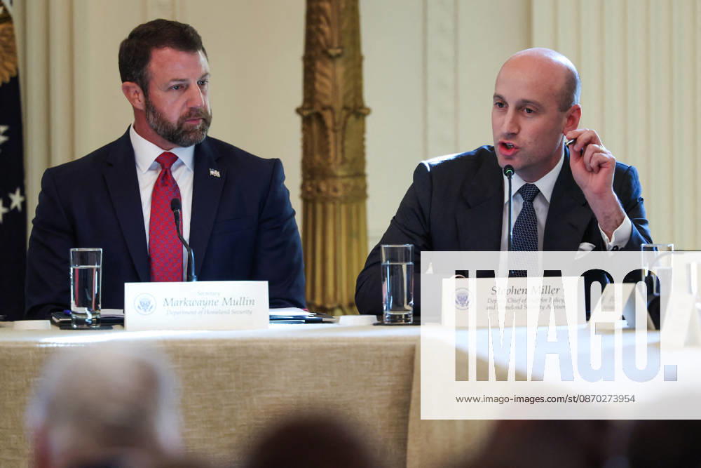 DC: President Trump Hosts Roundtable on Cybercrime at White House Markwayne Mullin, Secretary of Homeland Security, listens as Stephen Miller, White House Deputy Chief of Staff for Policy, speaks during a roundtable discussion on cybercrime in the East Room of the White House on October 21, 2026 in Washington, D.C. The administration is fighting back against foreign-based organized criminal organizations that exploit Americans in cyberspace and their scam centers and fraud schemes. (Photo by Samuel Corum Pool ABACAPRESS.COM) Washington DC United States