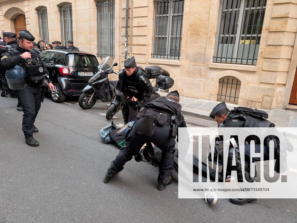 Students stage sit-in protest at Sciences Po Paris PARIS, FRANCE - OCTOBER 22: French gendarmerie officers intervene as students stage a sit-in protest outside Sciences Po Paris in Paris, France, on October 22, 2026. Students remain seated on the sidewalk as officers approach and attempt to remove protesters from the area. Luc Auffret Anadolu Paris France. Editorial use only. Please get in touch for any other usage.