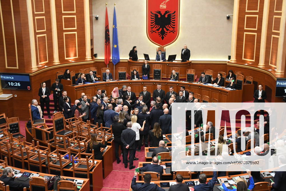 Opposition MPs stack chairs to disrupt parliamentary session in Tirana TIRANA, ALBANIA - OCTOBER 22: Opposition lawmakers stack chairs on top of their desks to disrupt a plenary session at the Albanian Parliament in Tirana, Albania, on October 22, 2026. Tensions flared and scuffles broke out in the assembly hall after the parliament leadership rejected demands by opposition MPs to include the ongoing ten-day student demonstrations in the official legislative agenda. Olsi Shehu Anadolu Tirana Albania. Editorial use only. Please get in touch for any other usage.