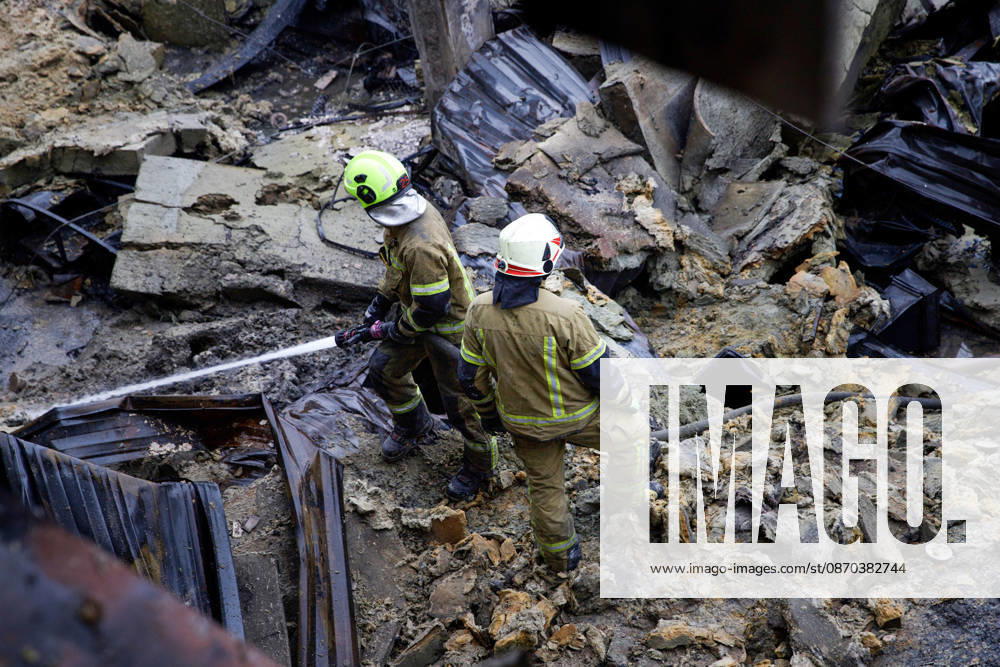 State Emergency Service rescue workers extinguish a fire caused by a Russian ballistic missile attack on an Epicentr K home improvement hypermarket and the surrounding shopping area in the Obolonskyi district, Kyiv, Ukraine, October 22, 2026. On Thursday night, Russian forces struck the Ukrainian capital with ballistic missiles and drones. According to the Kyiv City Military Administration, six districts came under attack. One person was killed, 24 were injured, and 16 of them were hospitalised. (Photo by Marianna Kotyk Ukrinform) Russian attack destroys shops in Kyiv