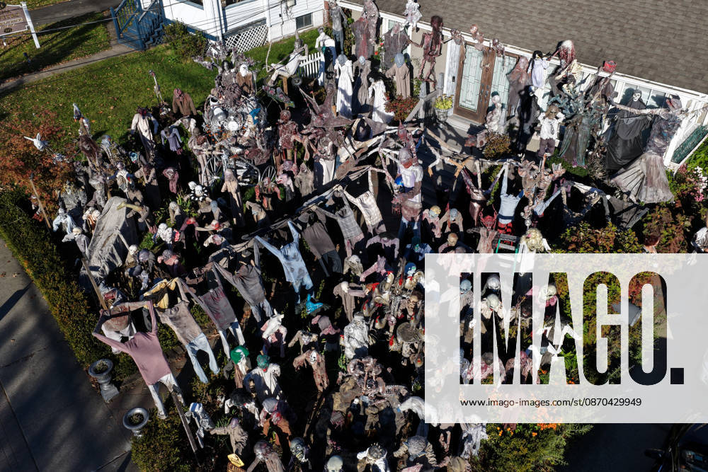 Handmade Zombies Take Over New Jersey Home for Halloween HAWTHORNE, NEW JERSEY - OCTOBER 22: An aerial view of a Halloween display featuring handmade zombies transforms the front lawn and roof of a home on Lafayette Avenue on October 22, 2026, in Hawthorne, New Jersey. Homeowner Tony Rodrigues creates the figures from scratch, incorporating 3D-printed faces into many of the designs. Inspired by Michael Jackson’s Thriller music video, Rodrigues has maintained the Halloween decoration tradition for more than a decade, turning his property into a seasonal attraction for visitors. Lokman Vural Elibol Anadolu New Jersey United States. Editorial use only. Please get in touch for any other usage.