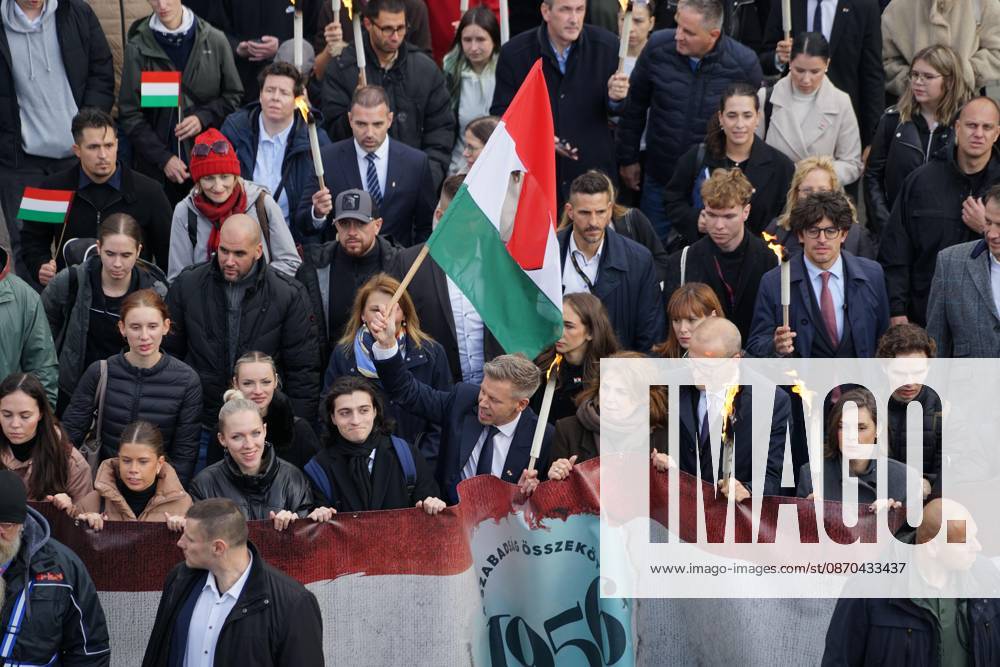 March of the Hungarian Prime Minister s party (Tisza Party) on the eve of the October 23 national holiday, commemorating the 70th anniversary of the 1956 Hungarian Revolution. October 23, 2026, marks the historic 70th anniversary of the 1956 Hungarian Revolution, a nationwide uprising against Soviet occupation and oppressive communist rule. This landmark anniversary is being observed through massive, solemn, and highly modernized nationwide commemorations across Hungary. Budapest Hungary - ZUMAp159 20261022_int_p159_522