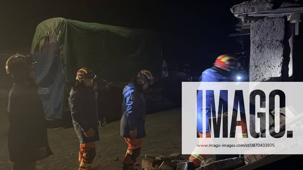 (261023) -- NAGQU, Oct. 23, 2026 -- Firefighters inspect an earthquake-hit village in Baqen County of Nagqu City in southwest China s Xizang Autonomous Region, on Oct. 23, 2026. Sixteen people were killed and 32 others injured after a 7.0-magnitude earthquake struck Baqen County of Nagqu City in southwest China s Xizang Autonomous Region at 10:33 p.m. Thursday (Beijing Time), according to the city s emergency management bureau. As of 2:25 a.m. Friday, 11 of the injured were in serious condition while 21 sustained minor injuries. Over 300 houses collapsed. The damage caused by the quake is being further evaluated, and disaster relief work is underway. More than 300 police officers have been dispatched to the epicenter for relief wor