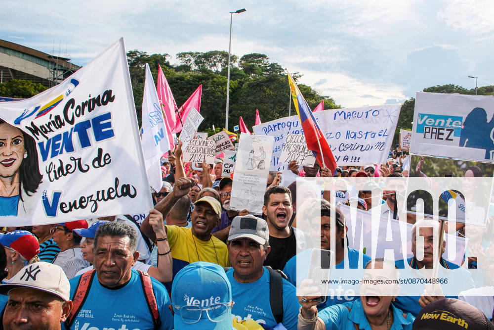 Venezuelan opposition supporters rally for free elections in Caracas CARACAS, VENEZUELA - OCTOBER 22: Members of political organizations such as Vente Venezuela, Primero Justicia, and Voluntad Popular gather in the surroundings of Plaza Venezuela in response to the call made by Venezuelan opposition leader and pro-democracy activist Maria Corina Machado, featuring speeches from various political and social leaders focused on memory, respect, democracy, and the demand for free elections in Caracas, Venezuela on October 22, 2026. Diko Betancourt Anadolu Caracas Venezuela. Editorial use only. Please get in touch for any other usage.