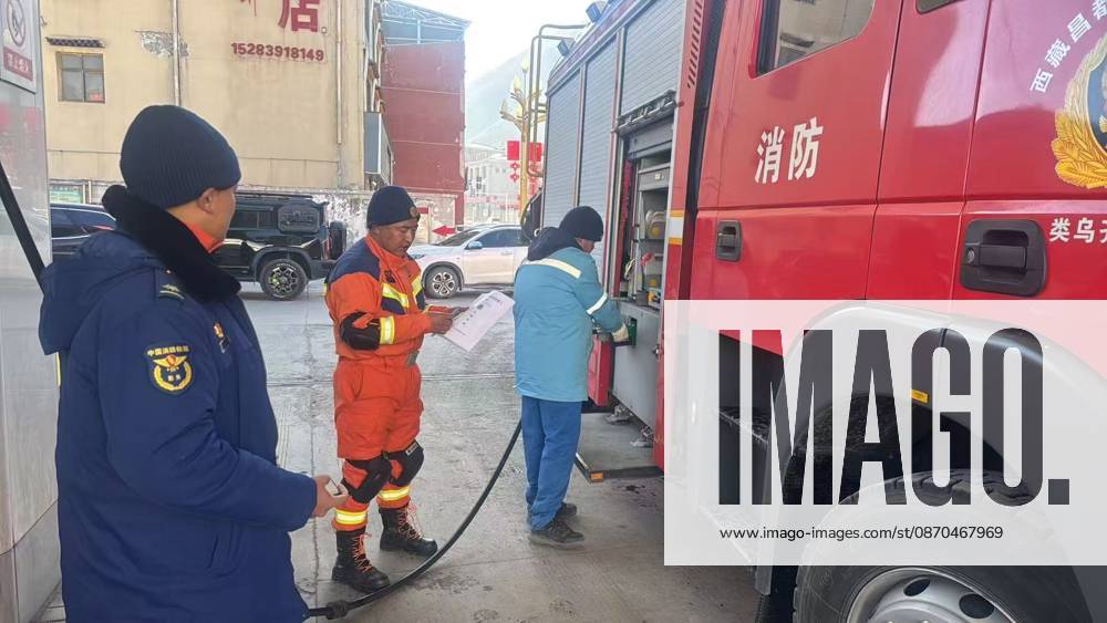 (261023) -- LHASA, Oct. 23, 2026 -- A staff member of PetroChina oil station refuels a fire engine bounding for the earthquake-hit Baqen County of Nagqu City in southwest China s Xizang Autonomous Region, on Oct. 23, 2026. Sixteen people were killed and 65 others injured after a 7.0-magnitude earthquake struck Baqen County of Nagqu City in southwest China s Xizang Autonomous Region at 10:33 p.m. Thursday, the city s earthquake relief headquarters said on Friday. The Ministry of Emergency Management and authorities in Xizang have mobilized resources for rescue and relief operations. (SpotNews) CHINA-XIZANG-NAGQU-EARTHQUAKE-RESCUE AND RELIEF (CN) JinxMeiduoji