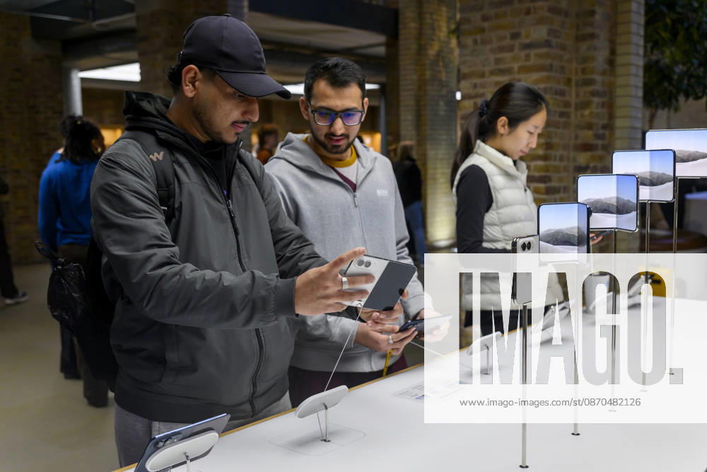 London, UK. Customers inside the Apple Covent Garden store view and buy the new Apple iPhone Duo, the companyâ€⠢s first foldable iPhone. Opened, it is the thinnest iPhone ever, with a 7.6-inch inner display that provides a large canvas for viewing content, gaming, and multitasking, and a special nano-texture finish that minimises glare for an unparalleled viewing experience. Closed, the 5.4-inch outer display delivers 90 percent of the screen area of iPhone 18 Pro in a compact, pocketable design. London UK - ZUMAl94_ 20261023_zaf_l94_018