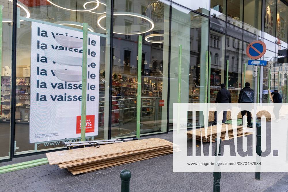 Storefronts boarded up with wooden panels at Rue Neuve Nieuwstraat, in Brussels, on Friday 23 October 2026. Stores are preparing for another protest scheduled for Saturday. NICOLASxMAETERLINCK 190739530