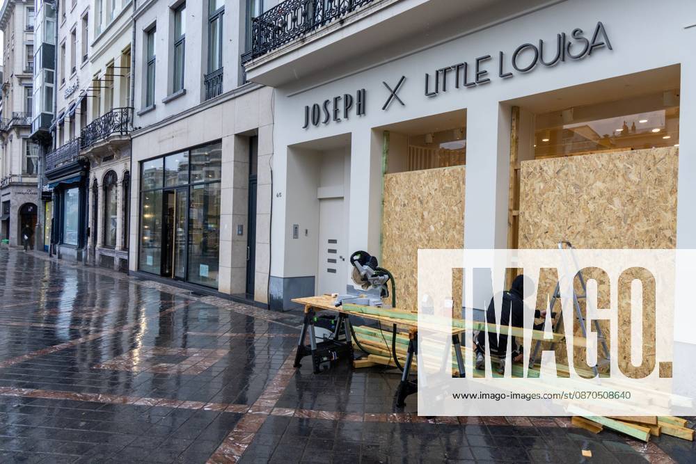 Storefronts boarded up with wooden panels, in Brussels, on Friday 23 October 2026. Stores are preparing for another protest scheduled for Saturday. NICOLASxMAETERLINCK 190744575