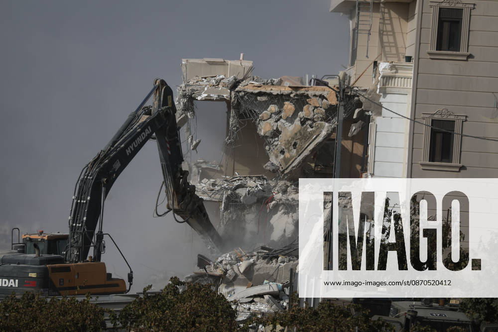 Israeli forces demolish a building in West Bank city of Hebron HEBRON, WEST BANK, PALESTINE - OCTOBER 23: Israeli military heavy machinery demolishes a building during a raid in the West Bank city of Hebron, Palestine, on October 23, 2026. The Israeli military announced earlier in the morning that two of its soldiers were killed during armed clashes with Palestinians, triggering a large-scale military operation and structural demolition in the city. Mamoun Wazwaz Anadolu Hebron West Bank. Editorial use only. Please get in touch for any other usage.
