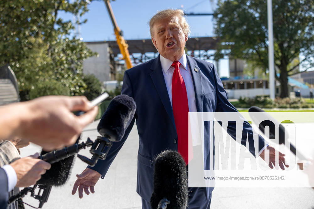 US President Donald Trump speaks to reporters outside the White House as he departs via Marine One on Friday, October 23, 2026 in Washington, DC. Trump will make a campaign stop in Florida before heading to Mar-a-Lago. WASP2026102301 TierneyxCross
