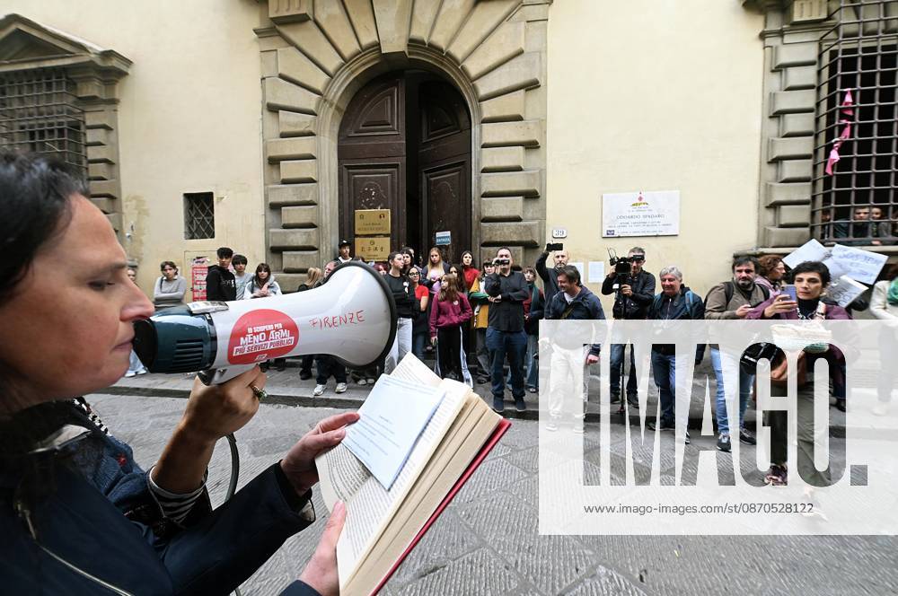 In front of the Machiavelli High School on Via Santo Spirito, a group of teachers held an open lesson on the street with megaphones and signs, addressing students leaning out of their windows and standing in front of the occupied school s door. Florence, October 23, 2026 Florence Italy - ZUMAa289 20261023_zia_a289_108