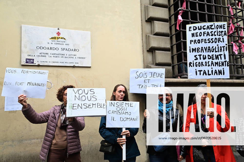 In front of the Machiavelli High School on Via Santo Spirito, a group of teachers held an open lesson on the street with megaphones and signs, addressing students leaning out of their windows and standing in front of the occupied school s door. Florence, October 23, 2026 Florence Italy - ZUMAa289 20261023_zia_a289_117